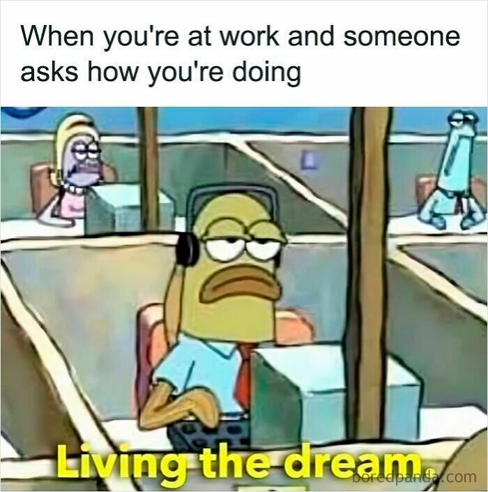 Cartoon fish at work cubicle looking tired with headset, caption about work memes and living the dream.