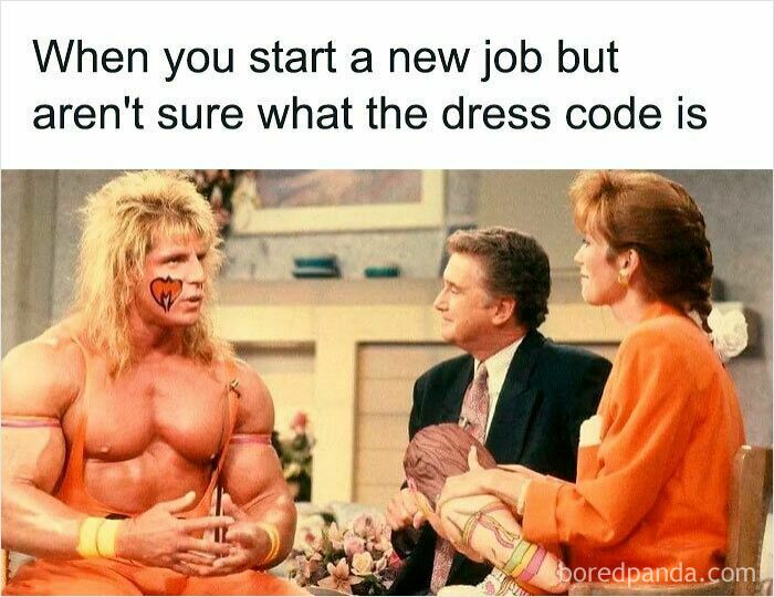 Man in face paint and muscle costume awkwardly sitting with two formally dressed coworkers in a work meme about dress code.