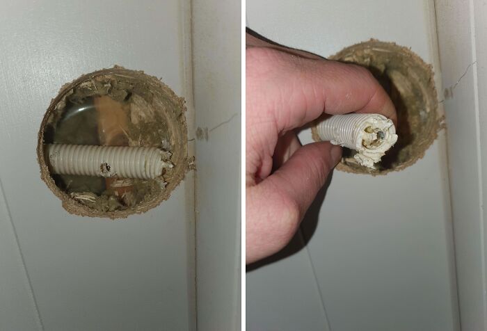 Close-up of damaged door lock mechanism showing broken white plastic piece inside, illustrating worst luck on vacation.