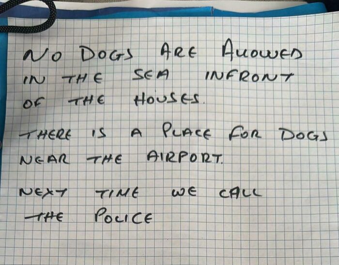 Handwritten note about dog restrictions by the sea, illustrating unlucky vacation moments shared by people.