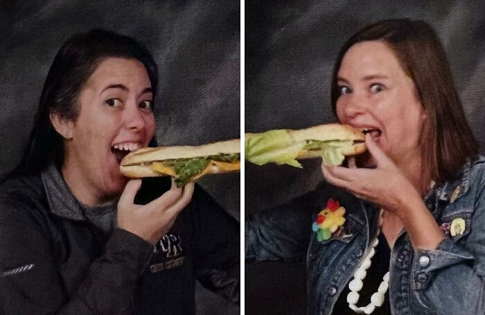 Two funny teachers playfully sharing a giant sandwich, showcasing their sense of humor in a lighthearted setting.