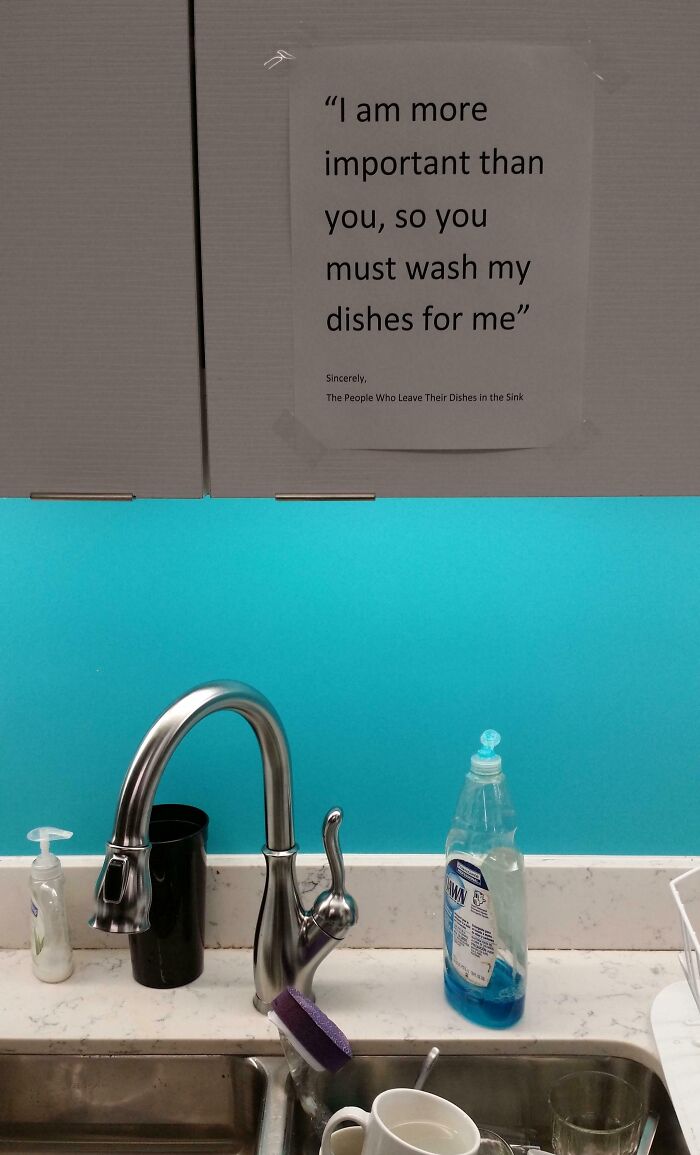 Passive-aggressive note in office kitchen demanding coworkers wash dishes, highlighting frustration and breaking point at shared workspace.