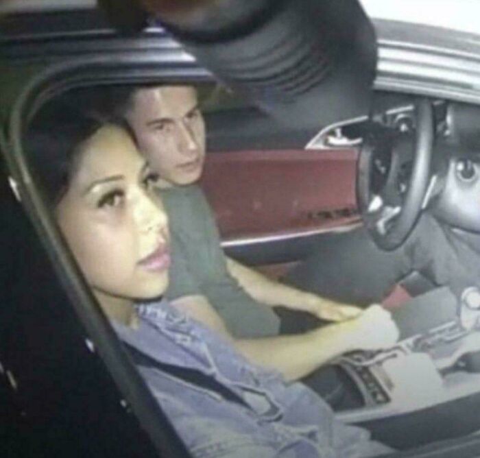 Two people sitting in a car at night, appearing surprised, representing facts that still remain undiscovered today.