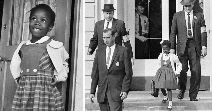 Young African American girl confidently entering school escorted by men in suits, highlighting still remains undiscovered history.