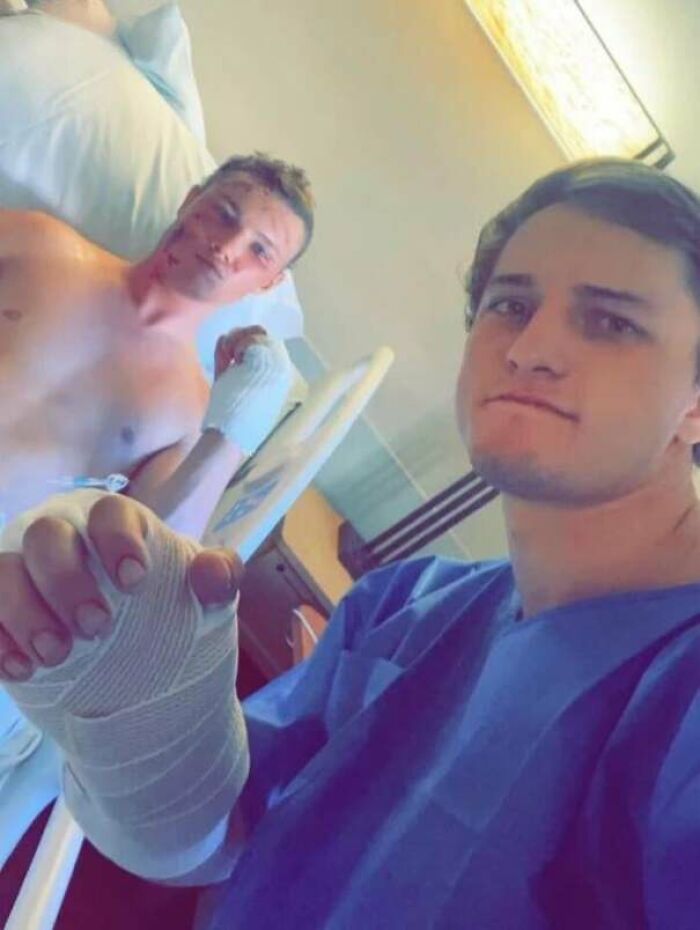 Two young men in a hospital room with bandaged hands, highlighting facts that still remain undiscovered to this day.