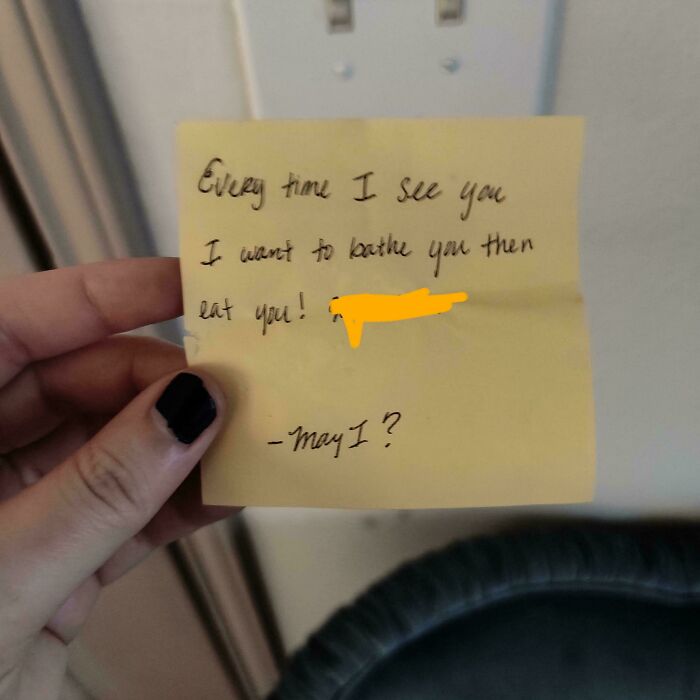 A hand holds a yellow sticky note with creepy text, an image from the "Hair Of Kids I Babysit" series.