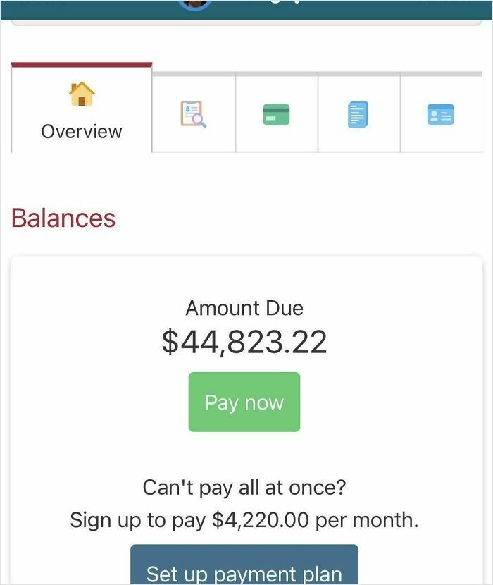 Medical bill payment screen showing a large amount due with option for a monthly payment plan in a dystopian US scene.