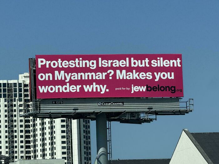 Billboard with a controversial message about protests, highlighting an attempt fail in addressing complex political issues.