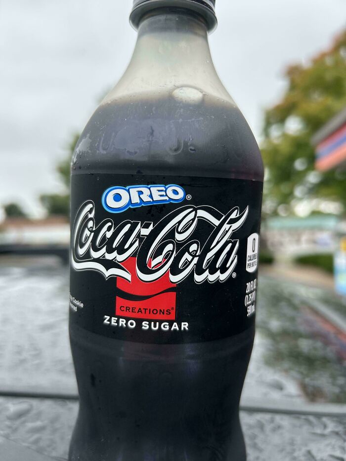 A bottle of Oreo Coca-Cola Creations zero sugar soda, showcasing a unique and nonsensical flavor combination.