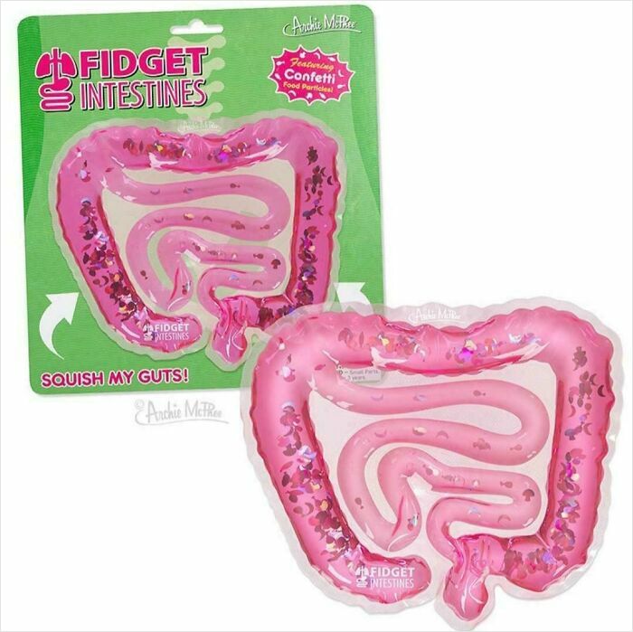 Pink fidget intestines toy filled with confetti food particles in clear packaging, a nonsensical thing that actually exists.