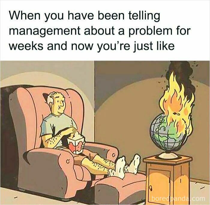 Man in armchair eating popcorn while a globe on fire burns nearby, illustrating work memes about ignored problems at work.