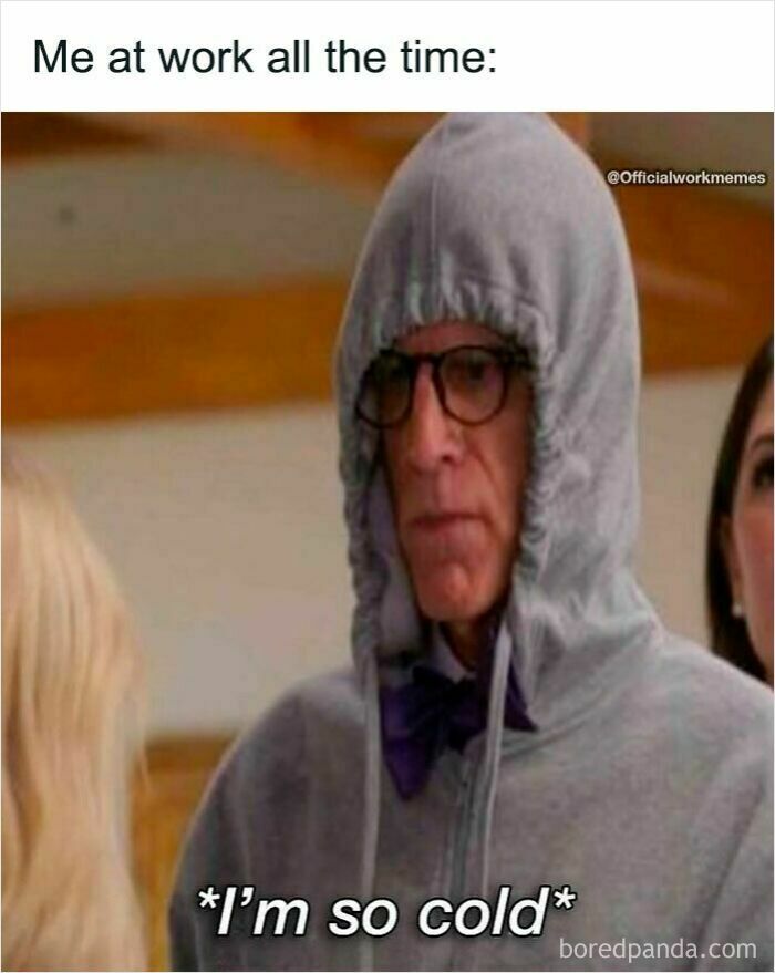 Man in hoodie and glasses at work looking cold, a relatable work meme for office humor and 3rd coffee break moments.