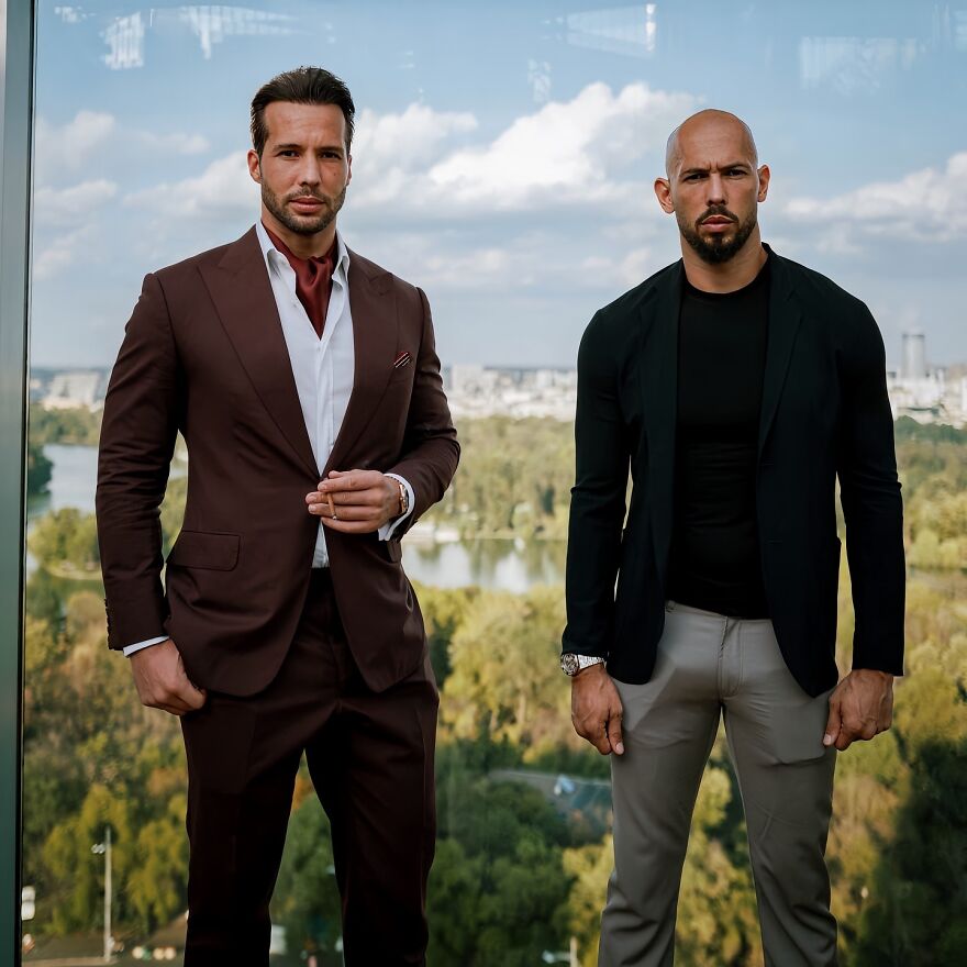 Tate brothers in formal attire standing by a window with a city view, highlighting Tristan Tate net worth influence in 2025.