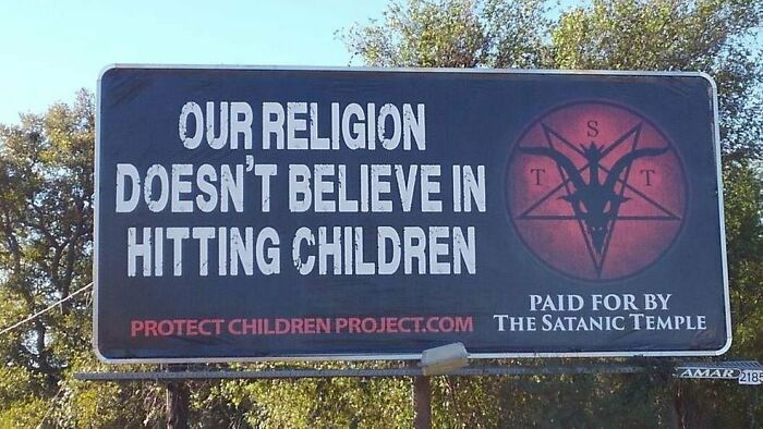 Billboard showing a message about religion and children, featuring a satanic temple symbol, part of funny and weird billboards.