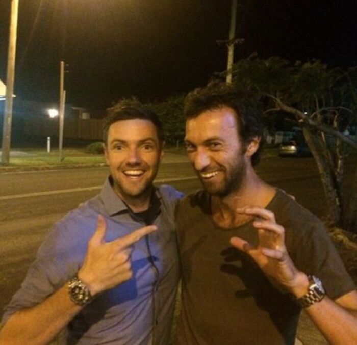 Two men posing and laughing at night on a street, a funny celebrity lookalike moment shared online tagged Johnny Derp.