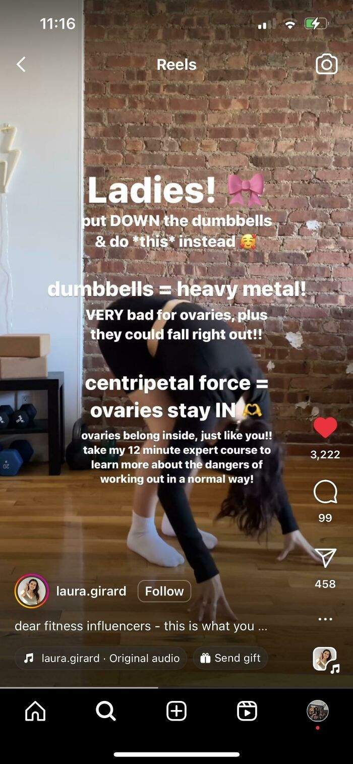 Woman stretching on wooden floor in black workout clothes with text about dumbbells and ovaries, fitness influencers, and baby gym.