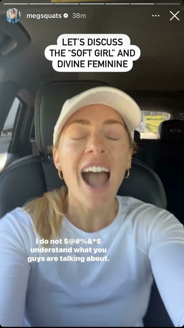 Woman in a white cap and shirt in a car, sharing a selfie video about fitness and feminine topics for baby and gym.
