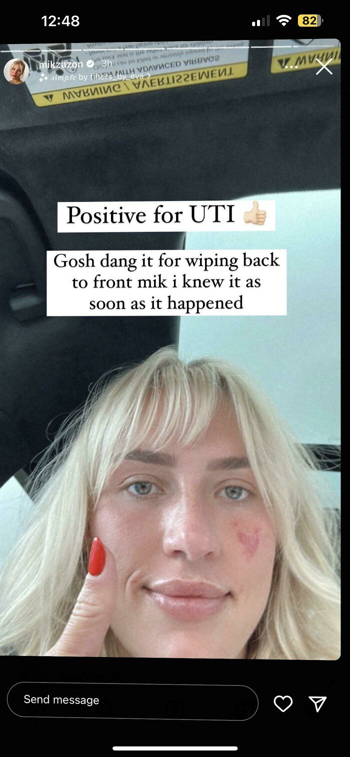 Blonde woman with a red nail shows thumbs up in a car, related to fitness influencers and taking your baby to the gym.