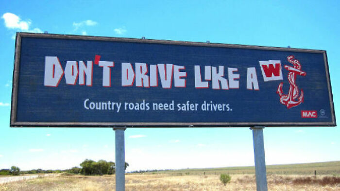 Funny and weird billboard warning drivers to be safe on country roads with a humorous message and anchor graphic.