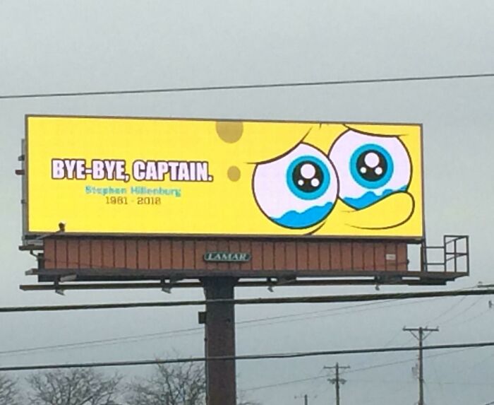 Funny and weird billboard featuring a crying cartoon character with a farewell message to Stephen Hillenburg.