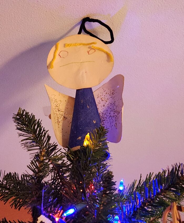 Handmade angel tree topper showing funny and wholesome creativity by parents, shared by their kids during festive season.