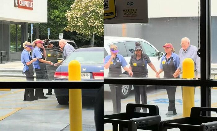 Group of people holding hands outside a restaurant, sharing inspiring facts that uplift and bring positivity.