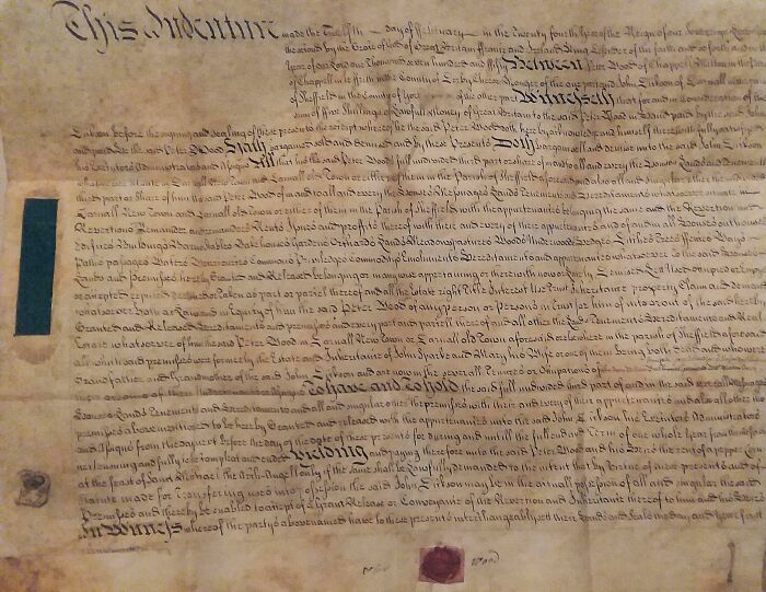 Old historical document with faded text and wax seals, an example of people finding something old without knowing what it is