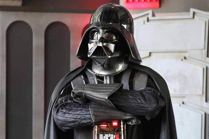 Person dressed as Darth Vader in detailed costume at an event, illustrating famous historical quotes misconceptions.