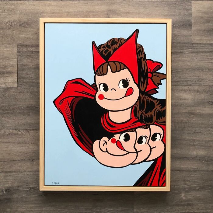 Pop culture and cartoon character mash-up artwork featuring stylized faces with red accents in a wooden frame.