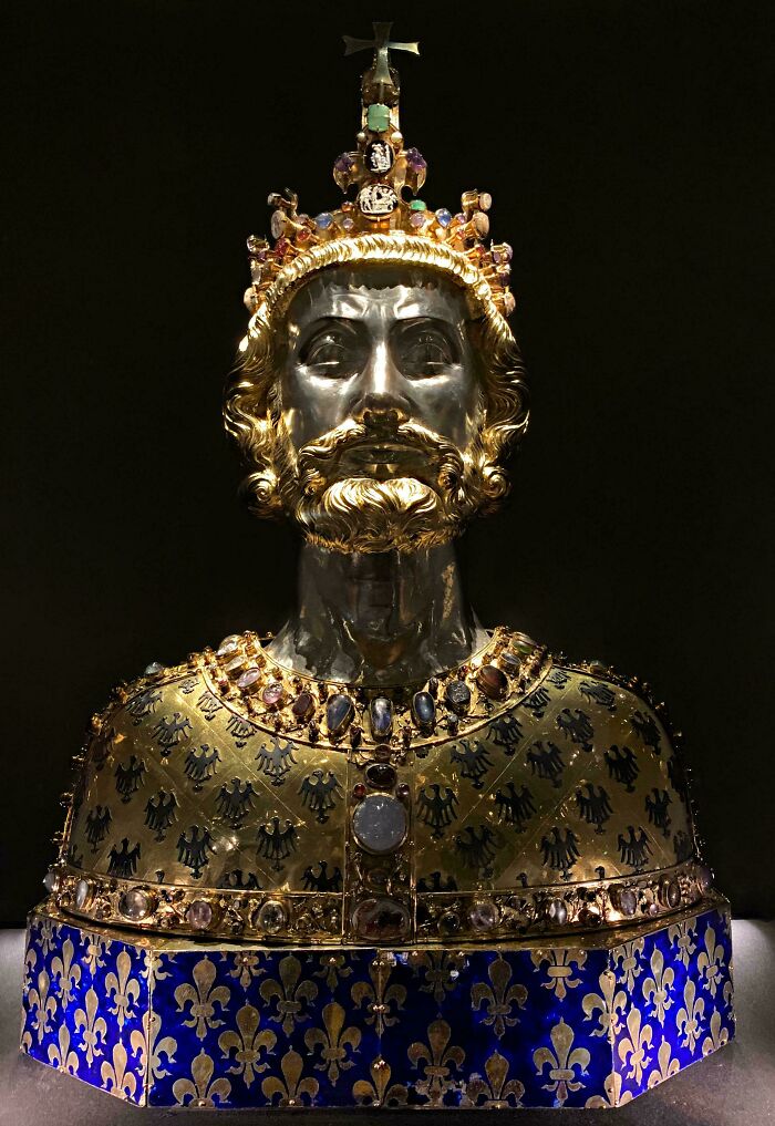 Ornate medieval bust of a king with gold crown and jeweled robe, popular among medieval history enthusiasts.