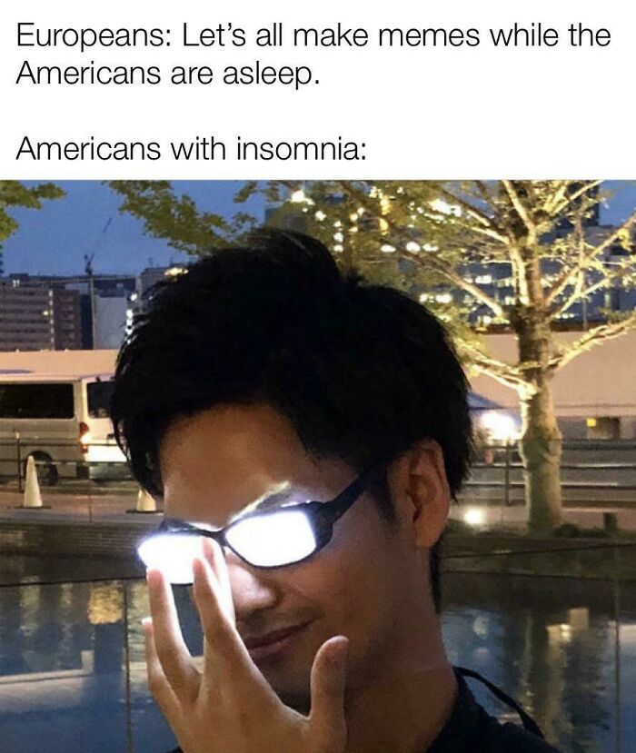 Man with glowing glasses at night, illustrating a funny insomnia meme about sleepless Americans making memes.