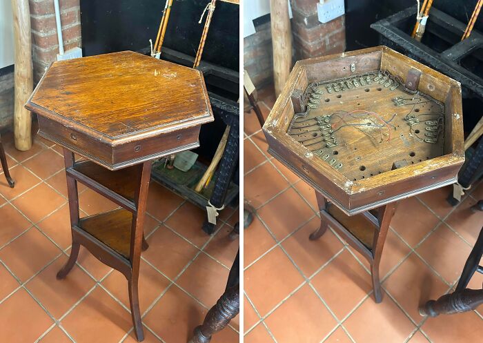 Hexagonal wooden table with hidden vintage mechanism inside, an old mystery object found and identified online.