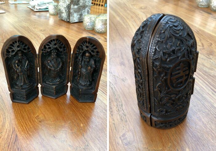 Intricately carved old wooden figurine set with detailed religious or cultural motifs found and identified online.
