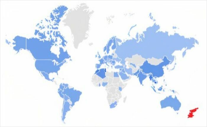 World map with countries colored in various shades of blue and one country in red, illustrating funny bad maps.