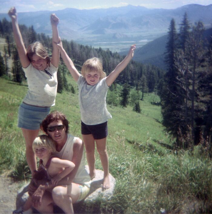 Vintage vacation pics of children and an adult enjoying a mountain view on a sunny day before cell phones had cameras.