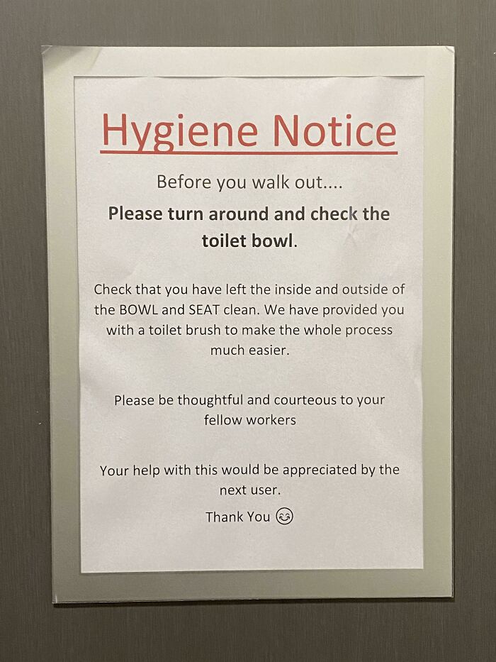 Passive-aggressive coworker note reminding to clean the toilet bowl for hygiene and courtesy in the shared workspace restroom.