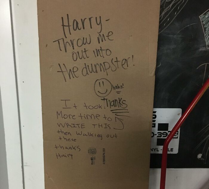 Passive-aggressive note on cardboard demanding someone named Harry be thrown into the dumpster with sarcastic thanks from a coworker.