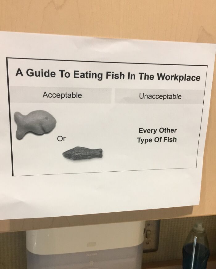 Passive-aggressive workplace note humorously showing acceptable and unacceptable fish for eating at work.