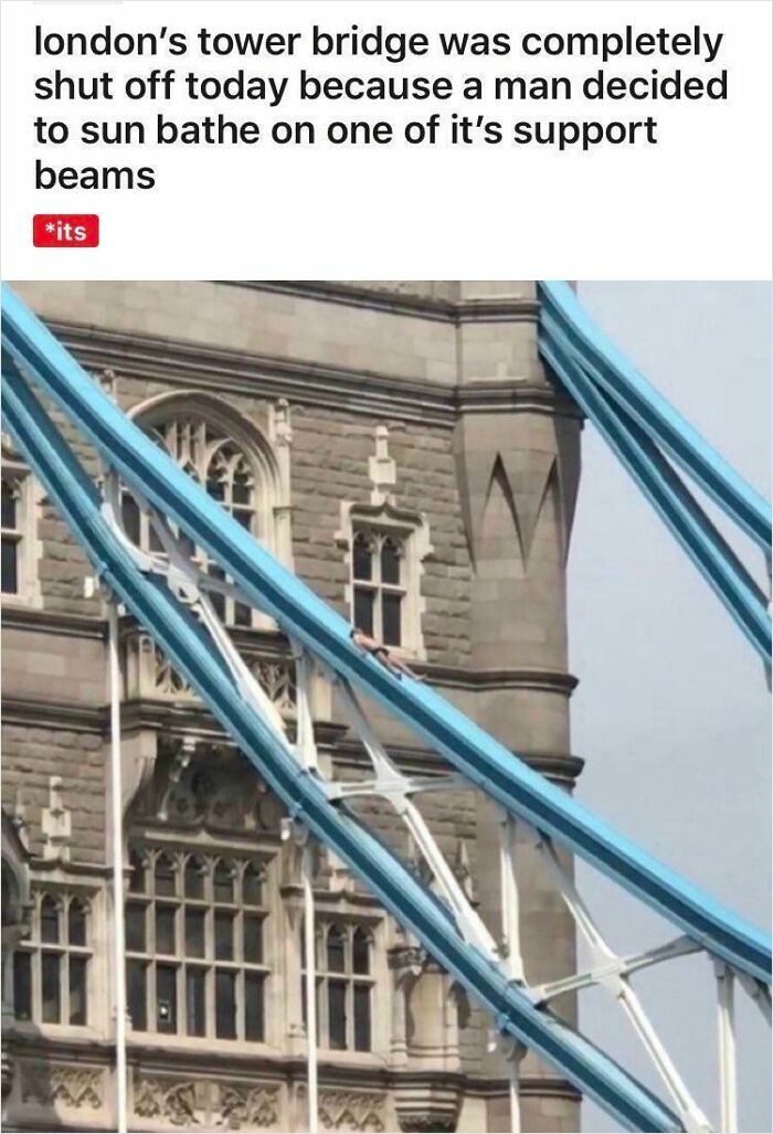 Man sunbathing on one of Tower Bridge’s support beams showing human for scale in an unusual way.