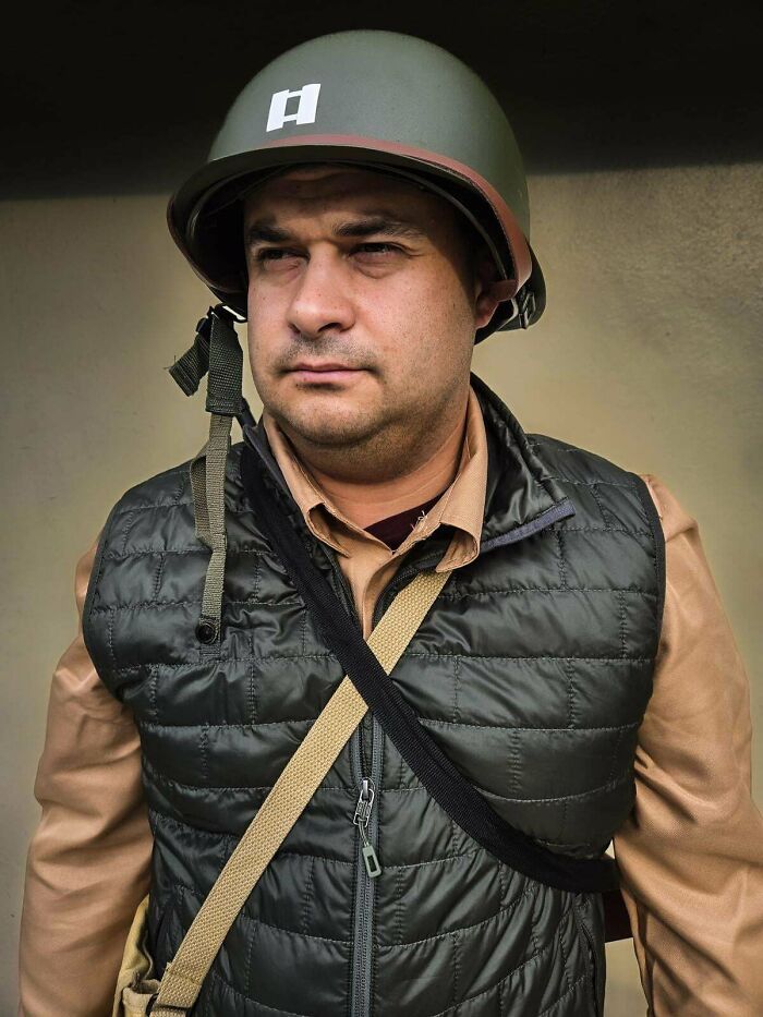 Man wearing a detailed Halloween costume with a military helmet and vest, showcasing genius Halloween costume ideas.