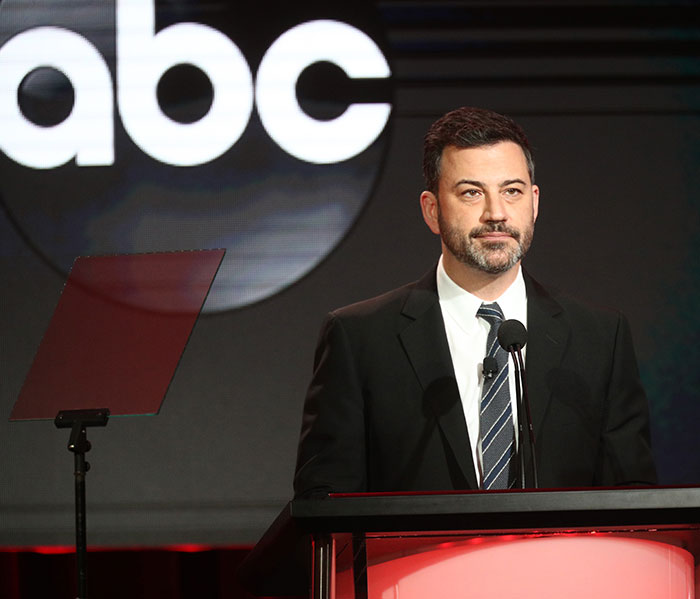 Jimmy Kimmel at a podium speaking during an ABC event, related to his show suspension and Hollywood reactions. Jimmy Kimmel at a podium speaking during an ABC event, related to his show suspension and Hollywood reactions.