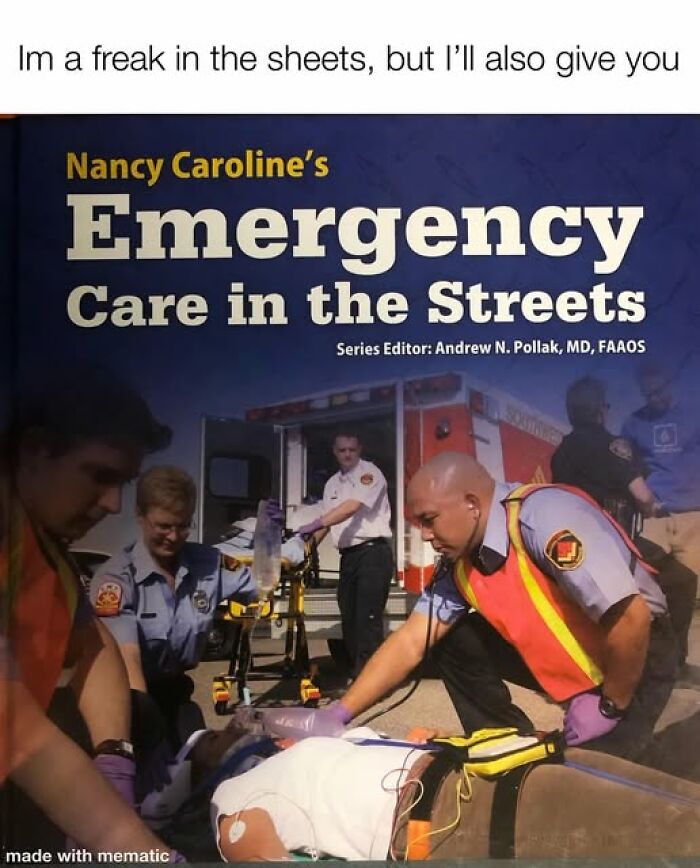 Paramedics providing emergency care on the street with ambulance and medical equipment in the background