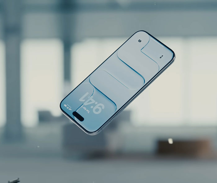 New iPhone floating in a blurred indoor setting illustrating Samsung mocks new iPhone shortly after Apple launches it New iPhone floating in a blurred indoor setting illustrating Samsung mocks new iPhone shortly after Apple launches it