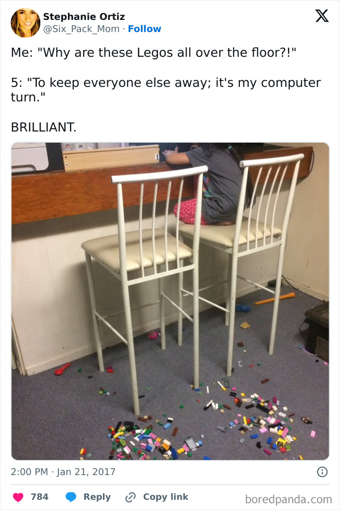 Child using Lego blocks to create a clever invention for keeping siblings away while using the computer.