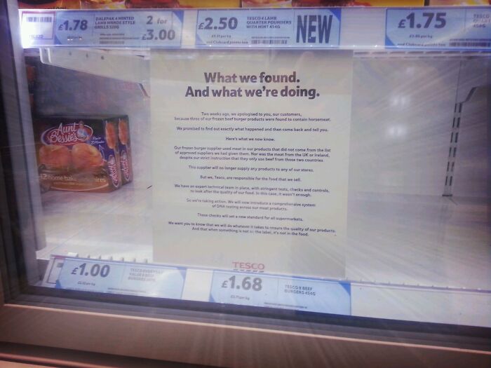 Tesco store display with notice about frozen beef burger fraud case and product pricing information.