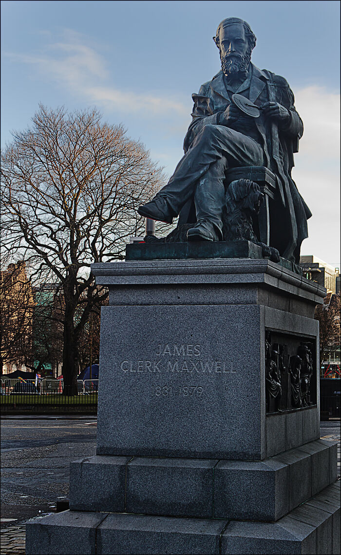 Statue of James Clerk Maxwell representing bold decisions that made a massive impact on science and the world.