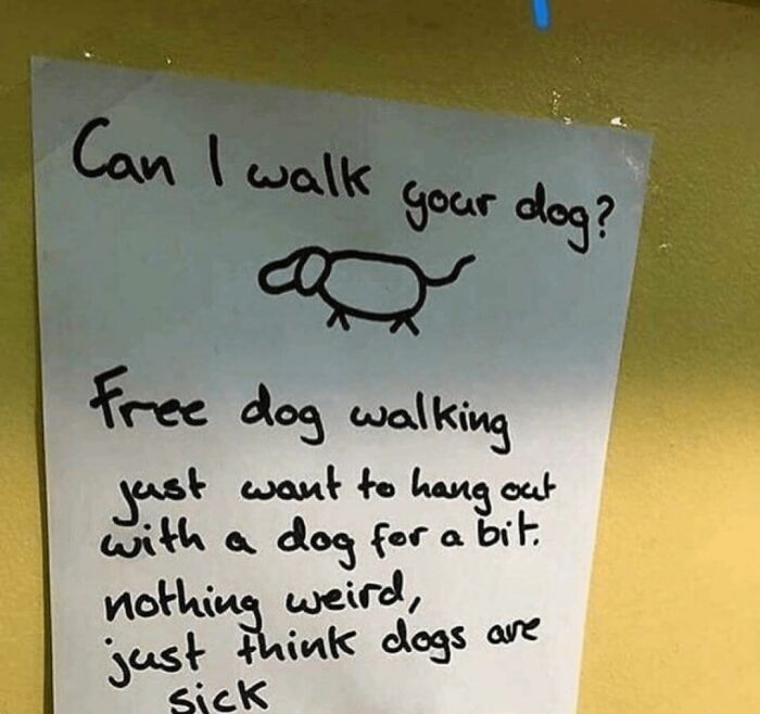 Handwritten sign offering free dog walking to spend time with dogs, part of wholesome posts to distract from world horrors.