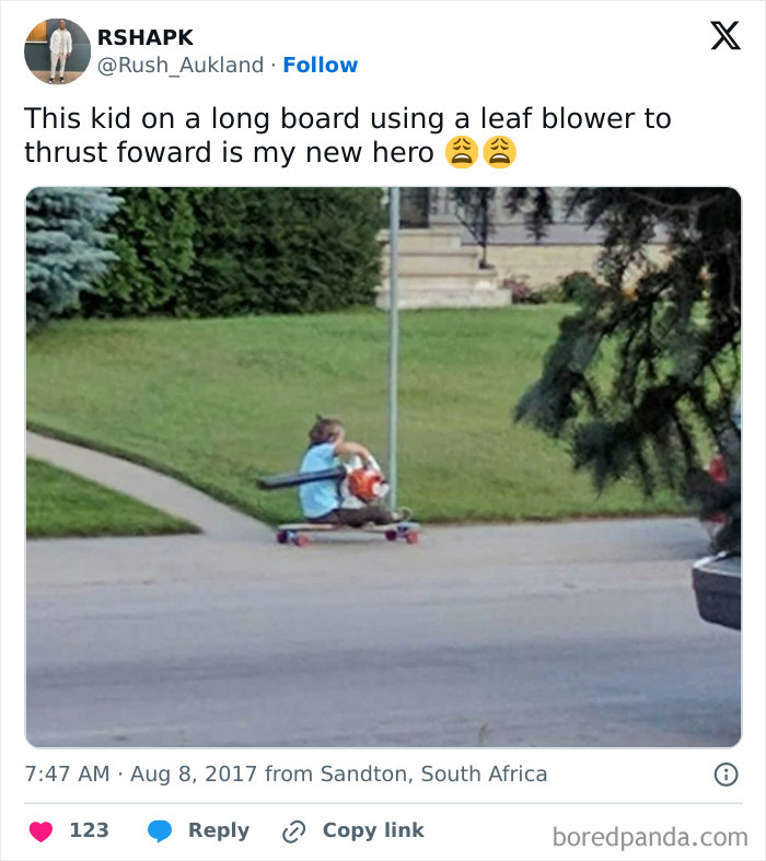 Child on skateboard using a leaf blower for propulsion, showcasing kids surprising parents with new inventions outdoors.