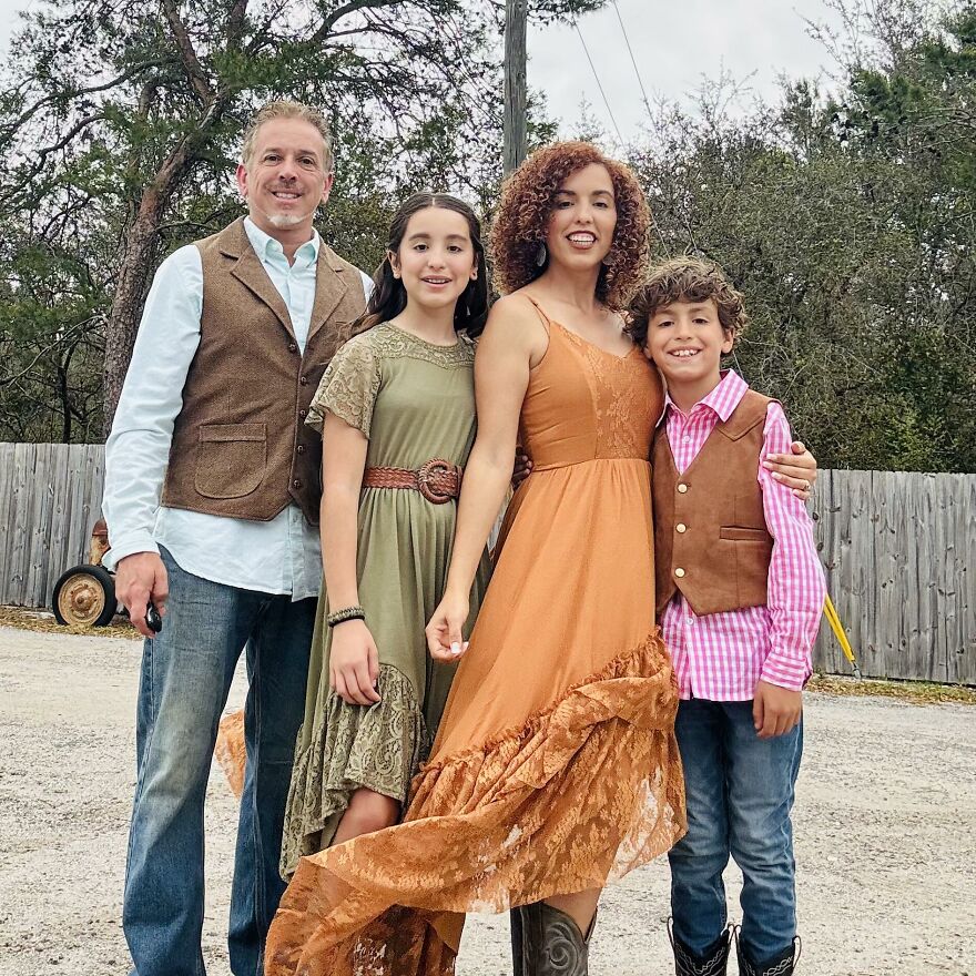 Family posing outdoors with woman mistaken for Phillies Karen after home run ball meltdown in a casual setting.