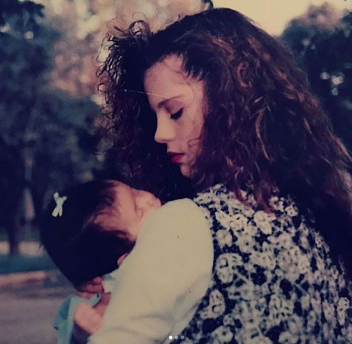 Vintage photo of Selena Gomez's mom holding baby daughter, highlighting Selena Gomez mom snubbed wedding story. Vintage photo of Selena Gomez's mom holding baby daughter, highlighting Selena Gomez mom snubbed wedding story.